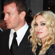 Illustration for article titled Madonna Sources Say Guy Ritchie Is Turning Son Rocco Against Her